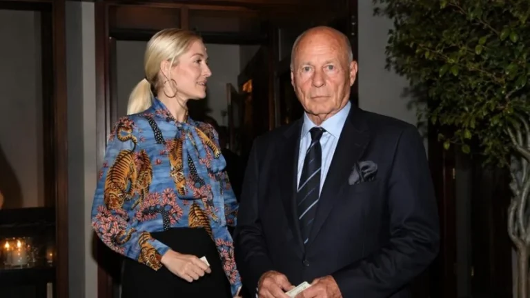 Karen Weitzul attending a formal event with her husband, highlighting her public appearance and profile.