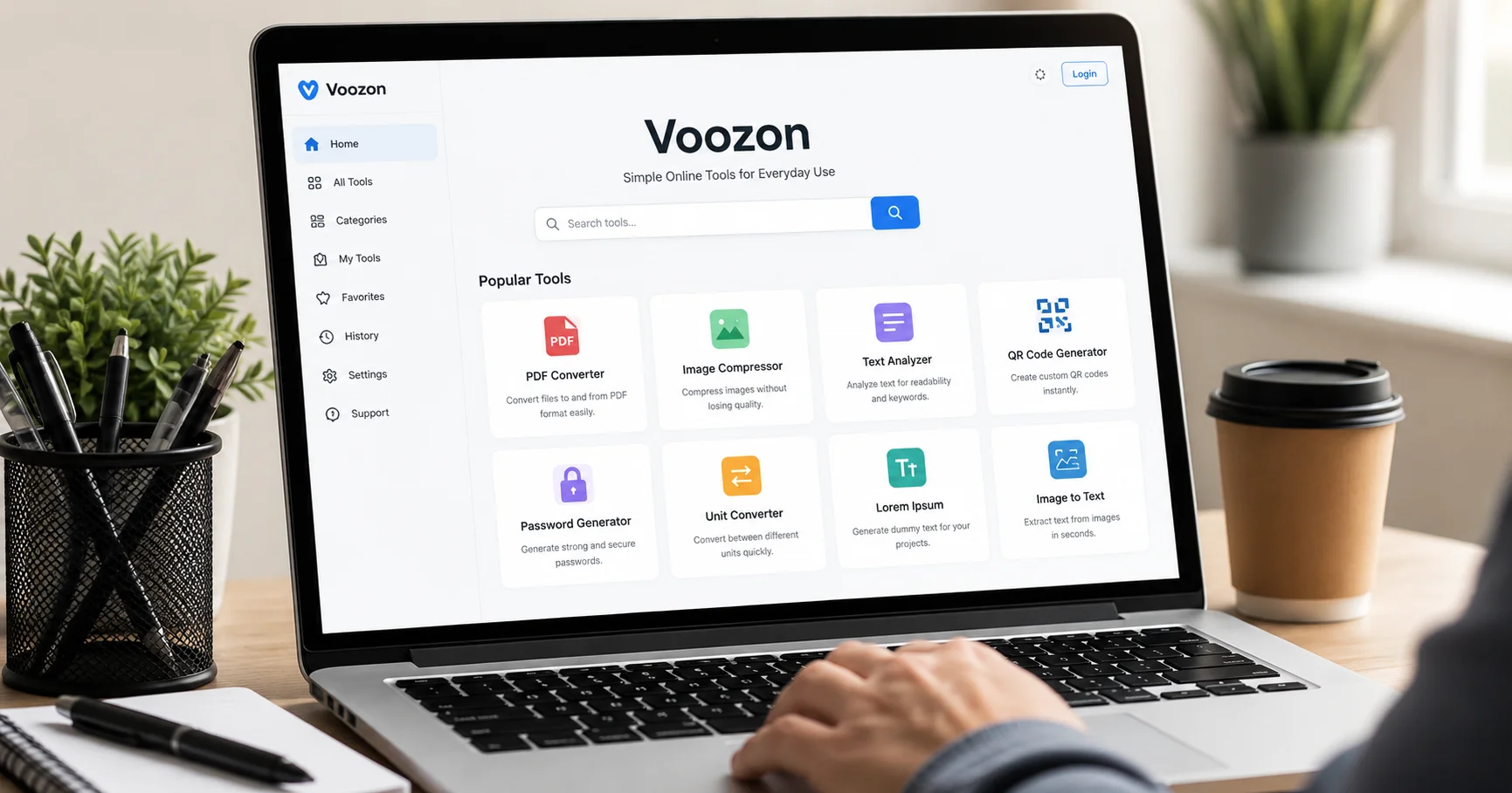 Laptop displaying Voozon web tool dashboard with minimal UI in a clean modern workspace setup with user interaction